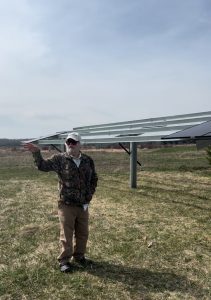 Bruce Steinhagen from Kewaunee County shows off his new solar panels. Bruce used federal tax credits provided by the IRA to offset some of the cost for his new solar system.